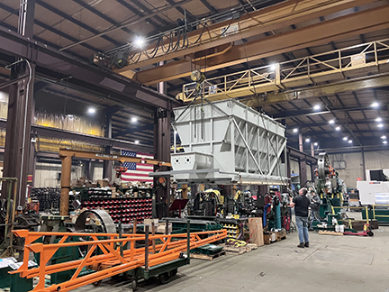 SDMC Factory Floor photo with flag in background